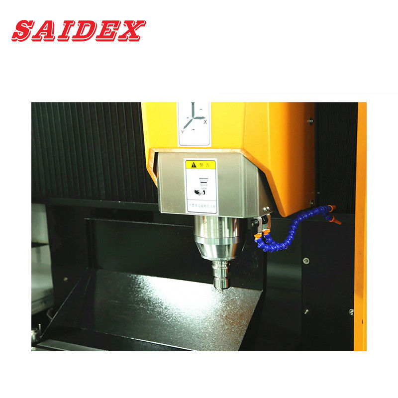 Machine CNC de sculpture acrylique de 8 kW 600x500x280 mm multi-fonction adaptée au traitement de l'aluminium, de l'acrylique, du PS、PC